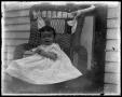 Photograph: [child in wicker chair #2]