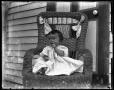 Photograph: [child in wicker chair #1]