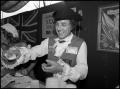 Photograph: [Man Serving British Pub Food]