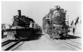 Photograph: [Two trains in Alamosa, Colorado]
