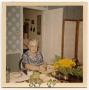 Photograph: [Carolyn Street Scott in Betty & Phil Scrivner's dining room]