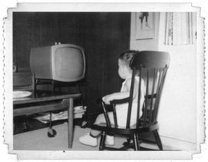 Ray Delphenis watching television