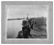 Photograph: [Photograph of Men and Women on the Bank of the Port Arthur Canal]
