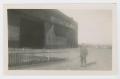 Photograph: [Laffal In Front of Hangar]