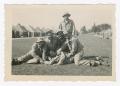 Photograph: [Soldiers Piled Atop Sergeant Franzone]