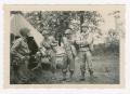 Photograph: [Soldiers Standing Outside Receiving Medical Station]