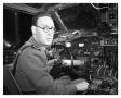 Photograph: [Peter Masefield in Cockpit of a C-87]