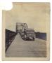 Photograph: [Pierce-Arrow automobile on bridge]