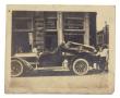 Photograph: [Pierce-Arrow automobile in front of store]