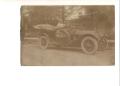 Postcard: [Man in Pierce-Arrow automobile]