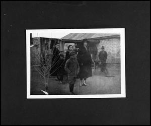 [Photograph of Lerma Family in Front of a House]
