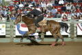 Photograph: [Woman Riding a Horse at Cowtown Coliseum]