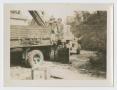 Photograph: [Soldier Standing on Barrel]