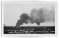 Postcard: Burning Oil Tank