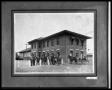 Photograph: Men & Horse Drawn Wagon in Front of Building