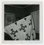 Photograph: [Woman Holding a Quilt]