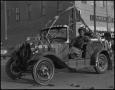 Photograph: [Photograph of a Car in a Rodeo Parade]