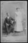 Photograph: [A man with a mustache and woman.]