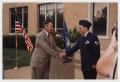 Photograph: [Photograph of McMurry President Dr. John Russell with Staff Sergeant…