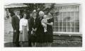 Photograph: [Photograph of Group in Front of W. H. Howard Home]