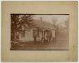 Photograph: [Photograph of a Family and House]