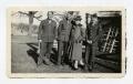 Photograph: [Photograph of Soldiers and Mrs. Moore]