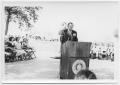 Photograph: [Man Speaking From a Podium]