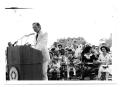 Photograph: [Man Speaking From a Podium]