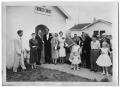 Photograph: [People Standing Outside the Church of Christ]