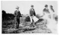 Photograph: [Four Men on Matthews Ranch Land]
