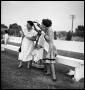Photograph: [Three Women by a Bench]