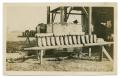 Postcard: [Photograph of a Machine and Bread]