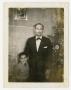Photograph: [Photograph of Father and Son on New Year's Eve]