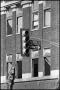 Photograph: [Tenth St Stoplight in Front of Johnson Drug Site]