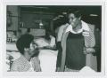 Photograph: [Barbara Jordan Speaks with a Patient at the Houston Veterans Adminis…