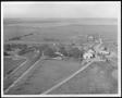 Photograph: [Aerial photograph of the house and the driveway at George Ranch]