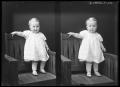 Photograph: [Baby in Knee-Length White Gown]