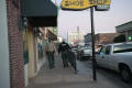 Photograph: [Officers walking towards Denton Square]