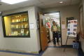 Photograph: [Attendee at entrance to ASD library]