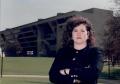 Photograph: [Mica England stands in front of Dallas City Hall]