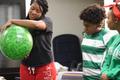 Photograph: [Buddy System students with conversation ball]