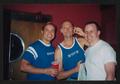 Photograph: [3 men in a group, 2: Lone Star Ride 2003 event photo]