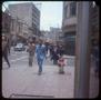 Photograph: [People Walking Down the Street in Bogotá, Colombia]