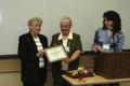 Photograph: [Elsie Wiley presents award to Texas Panhandle program]