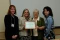 Photograph: [Elsie Wiley presents award to Fort Worth Senior Citizen Services]