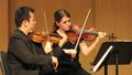 Photograph: [Samuel Sei-Jin Park and Ekatarina Tarasova perform String Quartet in…