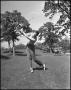 Photograph: [Individual Man Swinging Golf Club]
