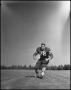 Photograph: [Football Player Number 72 on the Football Field]