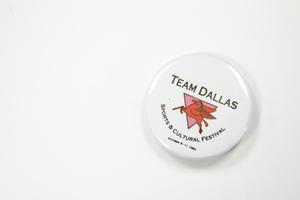 Primary view of object titled '[Team Dallas Sports and Cultural Festival Button]'.