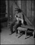 Photograph: [Old timer with dog]